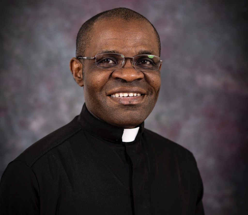        Rev . Michael Okata